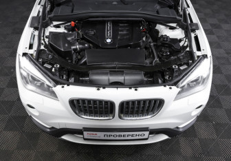 Подержанный автомобиль BMW X1 2013 года (9 фото)