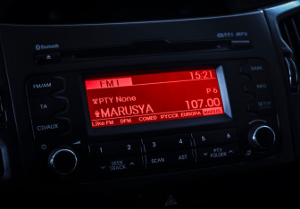 Подержанный автомобиль Kia Sportage 2013 года (16 фото)