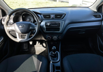 Подержанный автомобиль Kia Rio Sedan 2013 года (12 фото)
