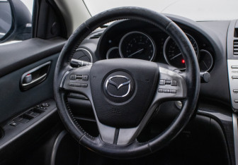 Подержанный автомобиль Mazda 6 Wagon 2008 года (15 фото)