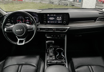 Подержанный автомобиль Kia K5 2021 года (12 фото)