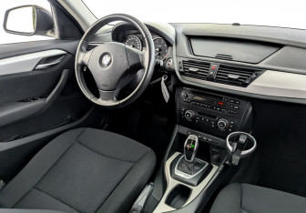 Подержанный автомобиль BMW X1 2012 года (26 фото)