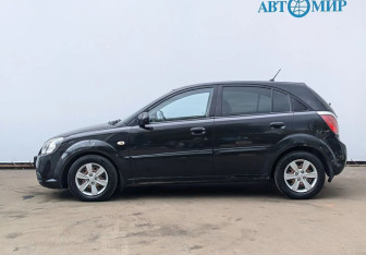 Подержанный автомобиль Kia Rio Hatchback 2011 года (8 фото)