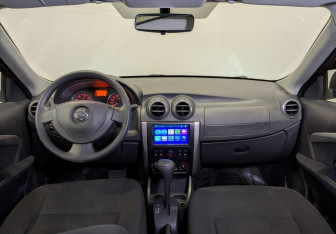 Подержанный автомобиль Nissan Almera Sedan 2013 года (14 фото)