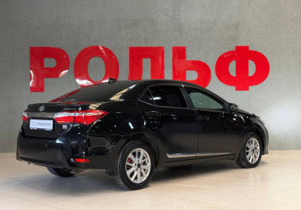 Подержанный автомобиль Toyota Corolla Sedan 2013 года (5 фото)