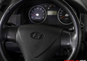 Подержанный автомобиль Nissan Tiida Hatchback 2010 года (14 фото)