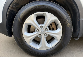 Подержанный автомобиль Kia Sorento 2013 года (9 фото)