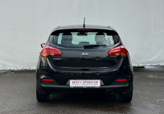 Подержанный автомобиль Kia Ceed Hatchback 2014 года (6 фото)