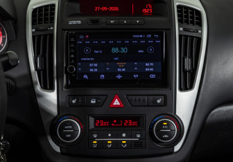 Подержанный автомобиль Kia Ceed Wagon 2011 года (12 фото)