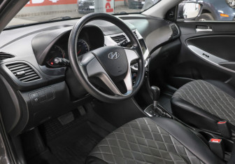 Подержанный автомобиль Hyundai Solaris Hatchback 2013 года (16 фото)