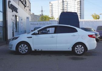Подержанный автомобиль Kia Rio Sedan 2011 года (8 фото)