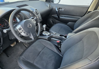 Подержанный автомобиль Nissan Qashqai+2 2013 года (9 фото)