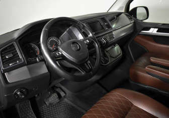 Подержанный автомобиль Volkswagen Multivan 2016 года (12 фото)