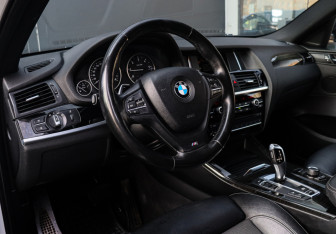Подержанный автомобиль BMW X4 2015 года (13 фото)