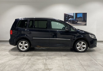 Подержанный автомобиль Volkswagen Touran 2013 года (4 фото)