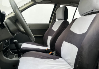 Подержанный автомобиль Suzuki Swift Sedan 2002 года (10 фото)
