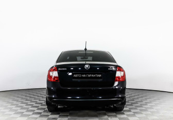 Подержанный автомобиль Skoda Rapid Liftback 2017 года (4 фото)