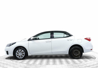 Подержанный автомобиль Toyota Corolla Sedan 2013 года (3 фото)
