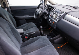 Подержанный автомобиль Nissan Tiida Sedan 2012 года (9 фото)