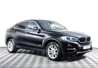 Подержанный автомобиль BMW X6 2015 года (3 фото)