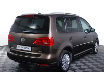 Подержанный автомобиль Volkswagen Touran 2013 года (5 фото)