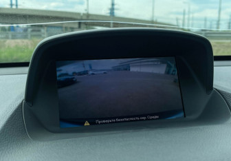 Подержанный автомобиль Opel Mokka 2014 года (14 фото)