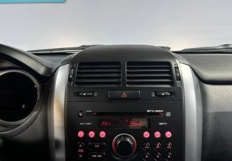 Подержанный автомобиль Suzuki Grand Vitara 2014 года (15 фото)