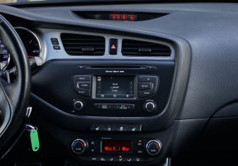 Подержанный автомобиль Kia Ceed Wagon 2014 года (11 фото)