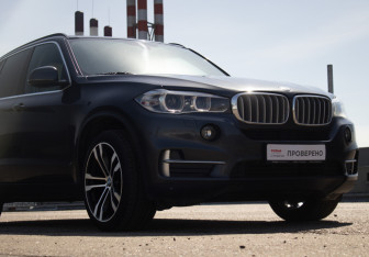 Подержанный автомобиль BMW X5 2015 года (27 фото)