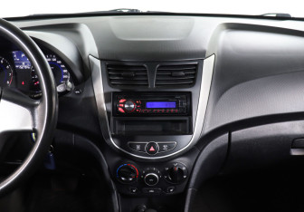 Подержанный автомобиль Hyundai Solaris Sedan 2014 года (14 фото)