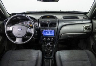 Подержанный автомобиль Nissan Almera Classic 2012 года (13 фото)