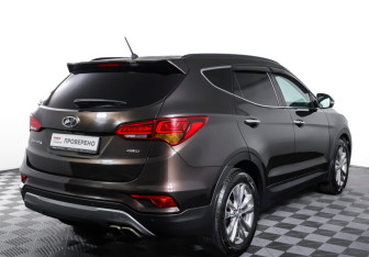Подержанный автомобиль Hyundai Santa Fe 2016 года (5 фото)