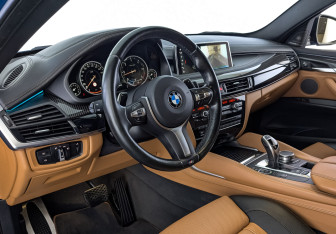Подержанный автомобиль BMW X6 2018 года (15 фото)