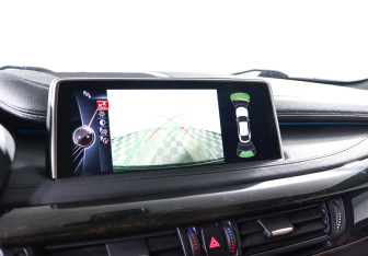 Подержанный автомобиль BMW X6 2015 года (18 фото)