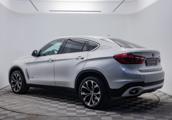 Подержанный автомобиль BMW X6 2015 года (3 фото)