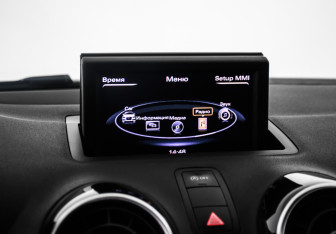 Подержанный автомобиль Audi A1 2012 года (14 фото)