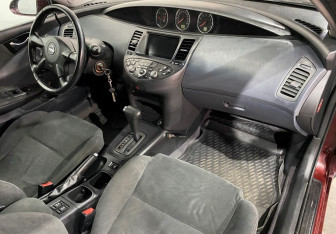 Подержанный автомобиль Nissan Primera Sedan 2004 года (9 фото)