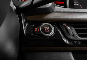 Подержанный автомобиль BMW X5 2014 года (21 фото)