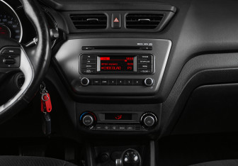 Подержанный автомобиль Kia Rio Sedan 2016 года (14 фото)