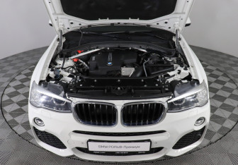 Подержанный автомобиль BMW X4 2016 года (10 фото)