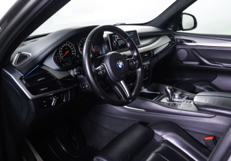 Подержанный автомобиль BMW X5 M 2015 года (15 фото)