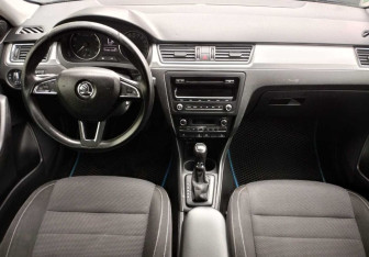 Подержанный автомобиль Skoda Rapid Liftback 2014 года (9 фото)
