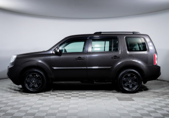 Подержанный автомобиль Honda Pilot 2013 года (8 фото)
