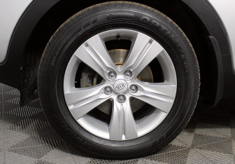 Подержанный автомобиль Kia Sportage 2012 года (15 фото)