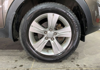 Подержанный автомобиль Kia Sportage 2013 года (17 фото)