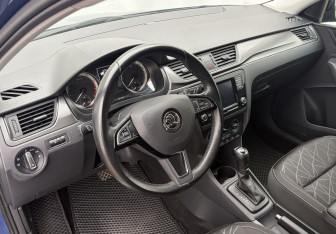 Подержанный автомобиль Skoda Rapid Liftback 2018 года (11 фото)