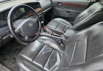 Подержанный автомобиль Opel Omega Sedan 2000 года (9 фото)