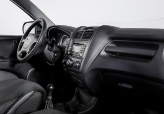 Подержанный автомобиль Kia Sportage 2009 года (9 фото)