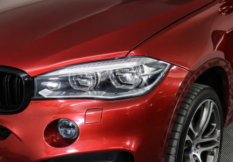 Подержанный автомобиль BMW X6 2016 года (7 фото)