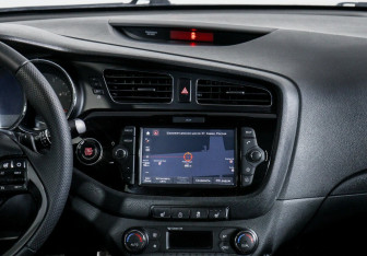 Подержанный автомобиль Kia Ceed Wagon 2013 года (10 фото)